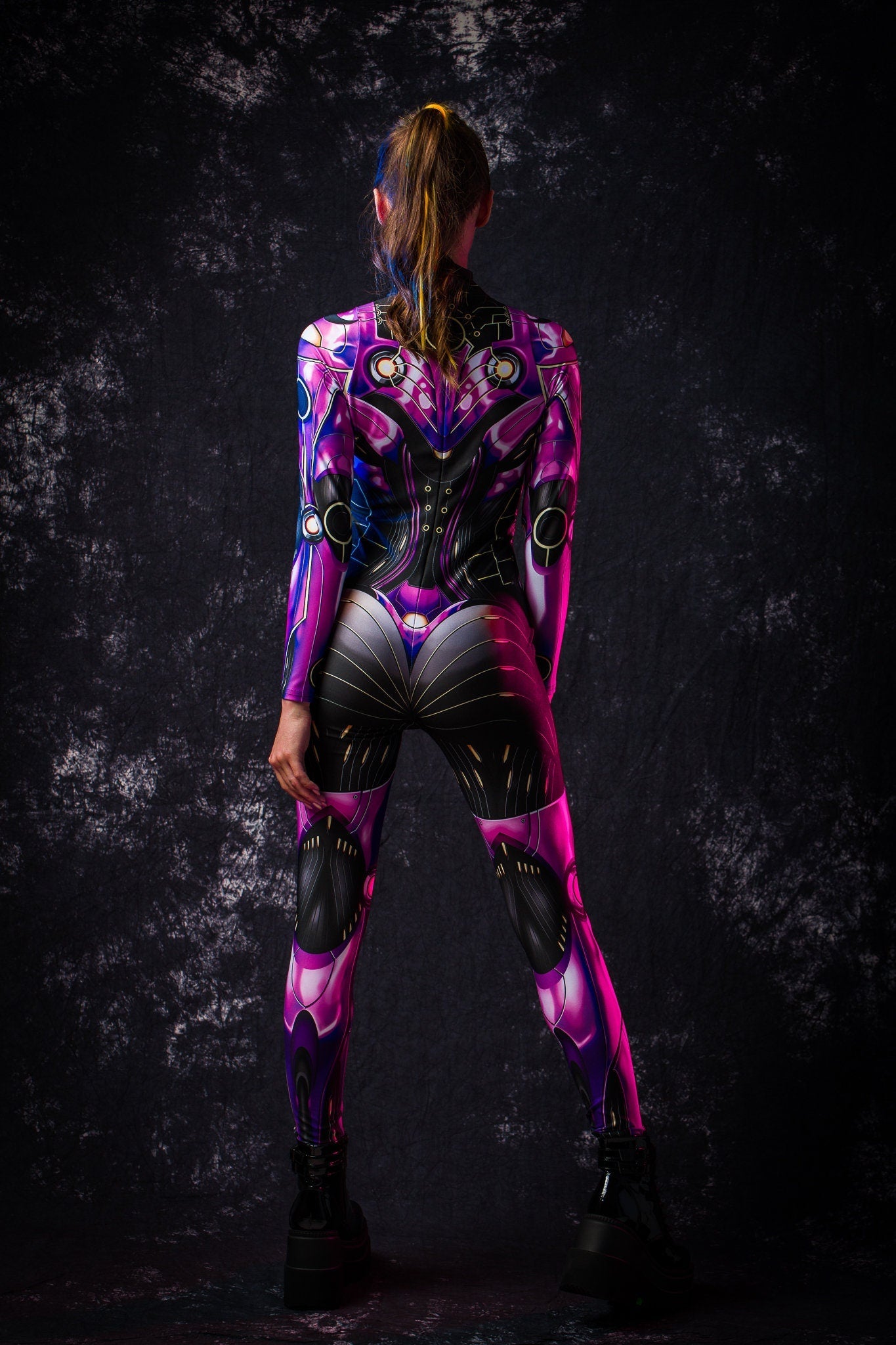 Close-up of the violet robotic and cyberpunk-inspired design on the full-body catsuit, ideal for a bold Halloween or futuristic festival look.