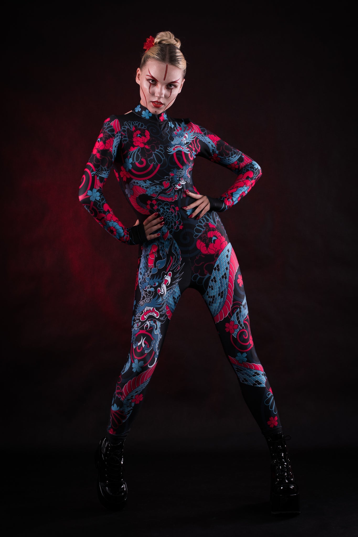 Woman posing in the Oriental Blossom costume, highlighting the delicate floral design and elegant fit, great for Halloween, themed events, or as a festival outfit.