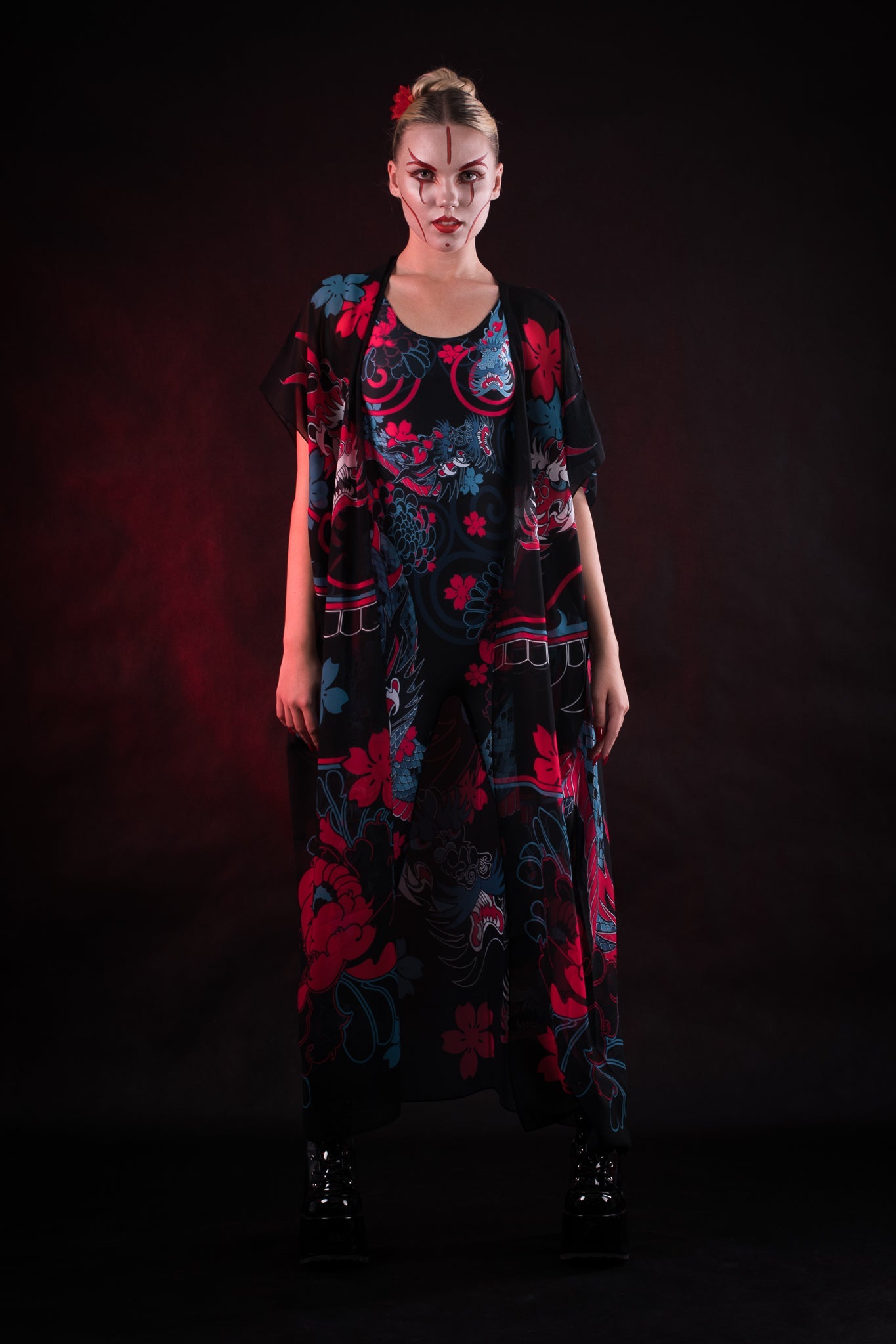 Woman wearing the Oriental Blossom costume, a full-body suit with floral accents and traditional-inspired style, perfect for Halloween parties or festivals.