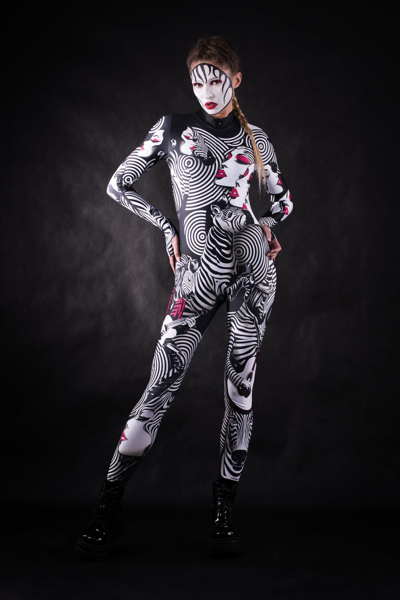 Woman posing in the White Zebra Femme Halloween costume, showcasing the bold black and white zebra design, great for Halloween, festivals, or as a stylish statement outfit.