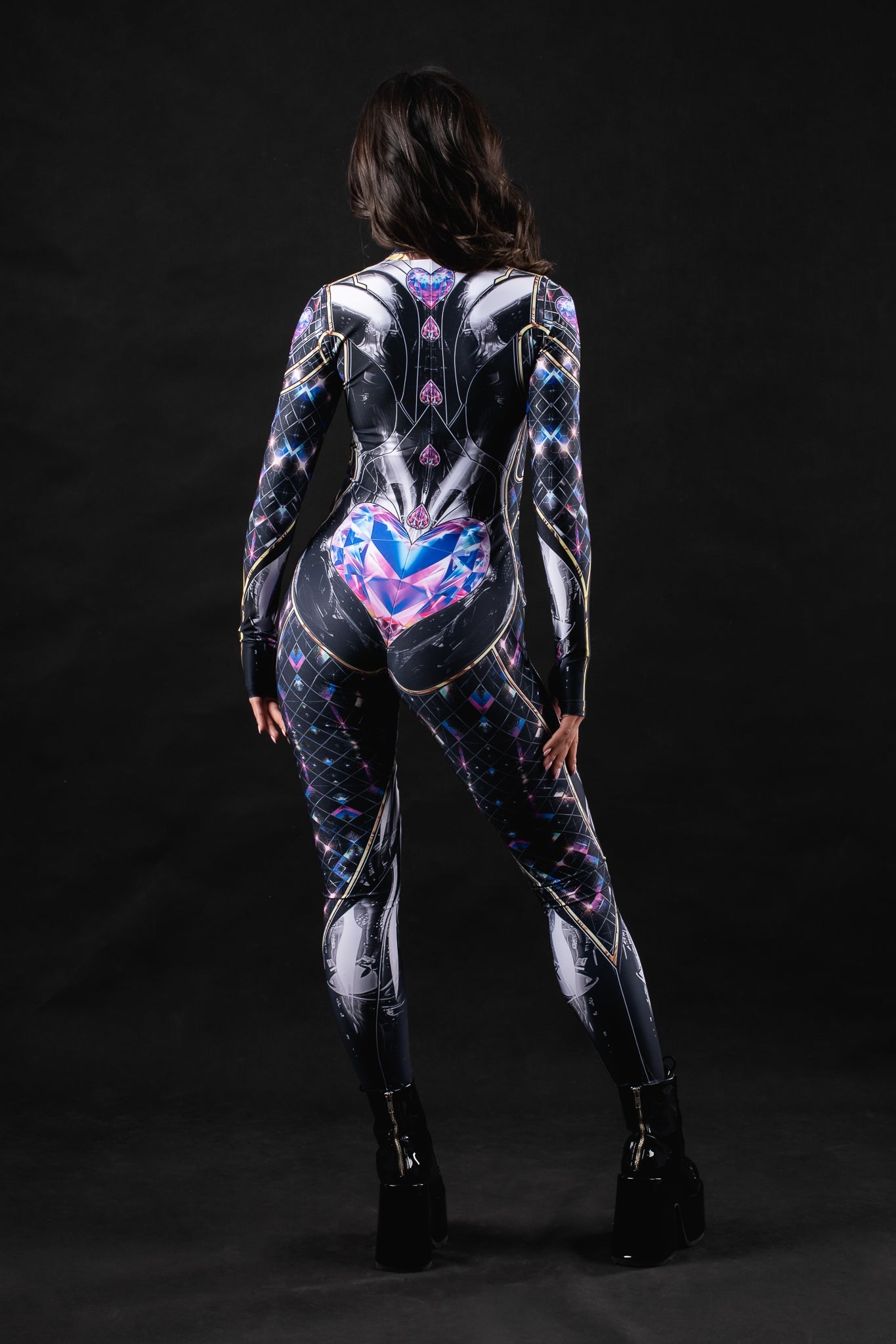 Woman wearing the Black Cyber Disco costume, a full-body suit with disco-inspired cyber details, perfect for Halloween or rave events.