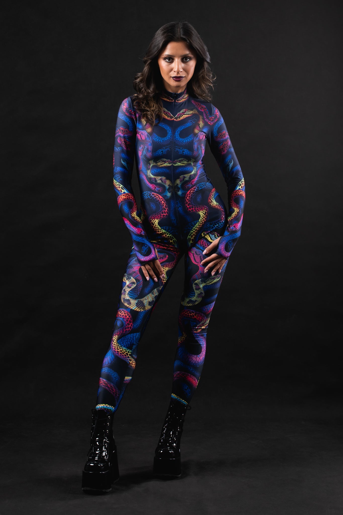 Woman wearing the Snakes & Shades costume, a full-body suit with snake print and vibrant shades, ideal for Halloween parties or festival outfits.