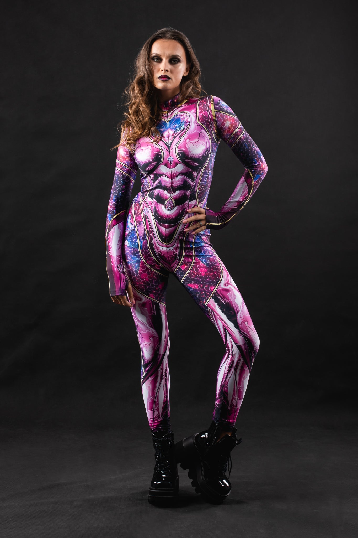 Woman posing in the Pink Cyber Disco costume, highlighting the vibrant pink design with cyber accents, ideal for Halloween, festivals, or as a unique party outfit.