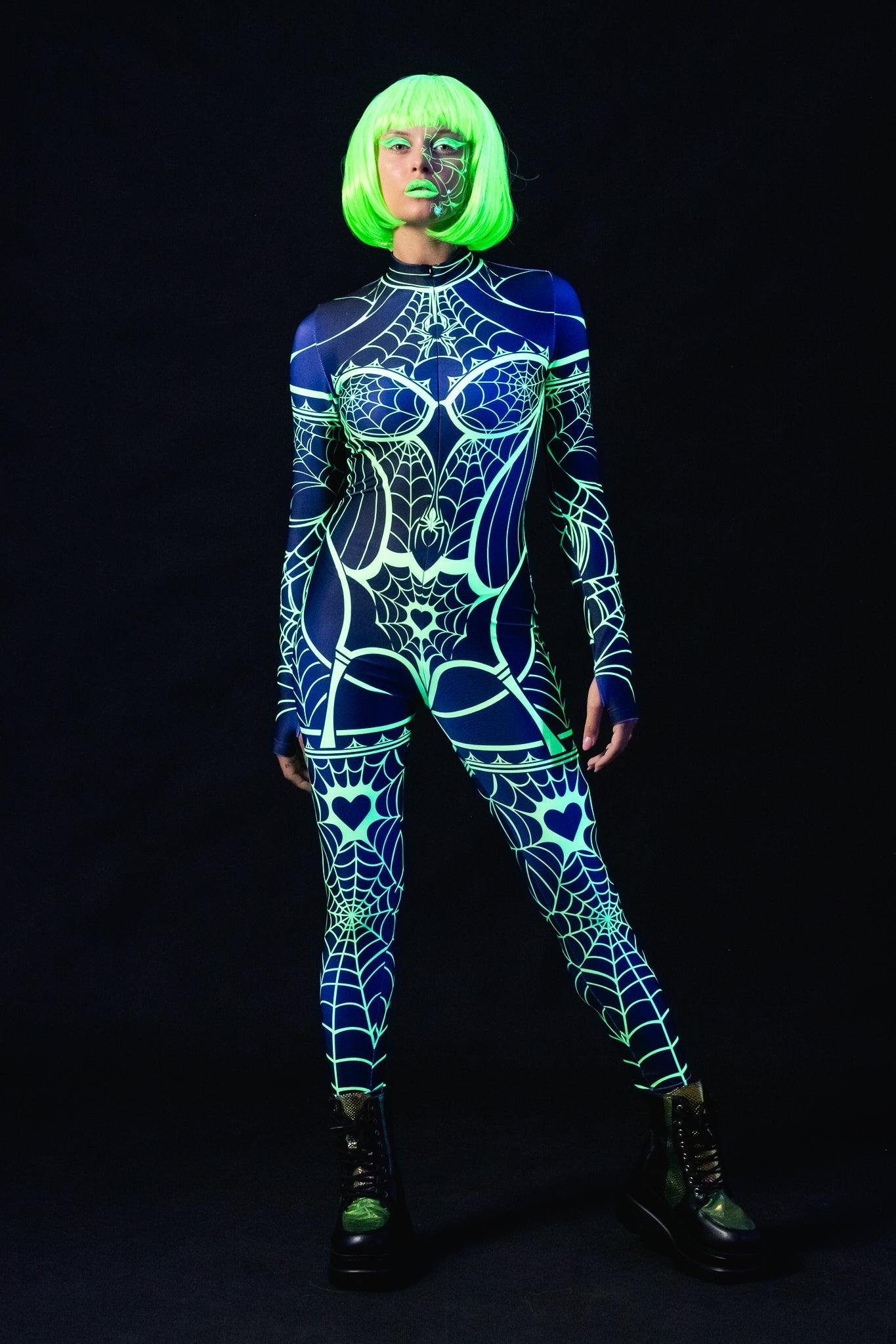 Green Neon Spiderweb UV Reactive costume for women, featuring a vibrant green spiderweb design that glows under UV light, perfect for Halloween, raves, or festivals.