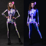 Woman posing in the Pink Doodle Skeleton UV Reactive Halloween costume, showcasing the bright pink skeleton design that glows under UV light, great for Halloween, raves, or as a standout festival outfit.