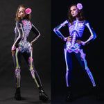 Close-up of the UV-reactive pink skeleton doodle design on the Halloween costume, glowing under UV light for a unique and bold look.