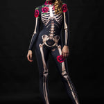 Woman wearing a skeleton-print bodysuit with floral rose accents and cloak, Day of the Dead-inspired, with sugar skull face paint and a rose crown.