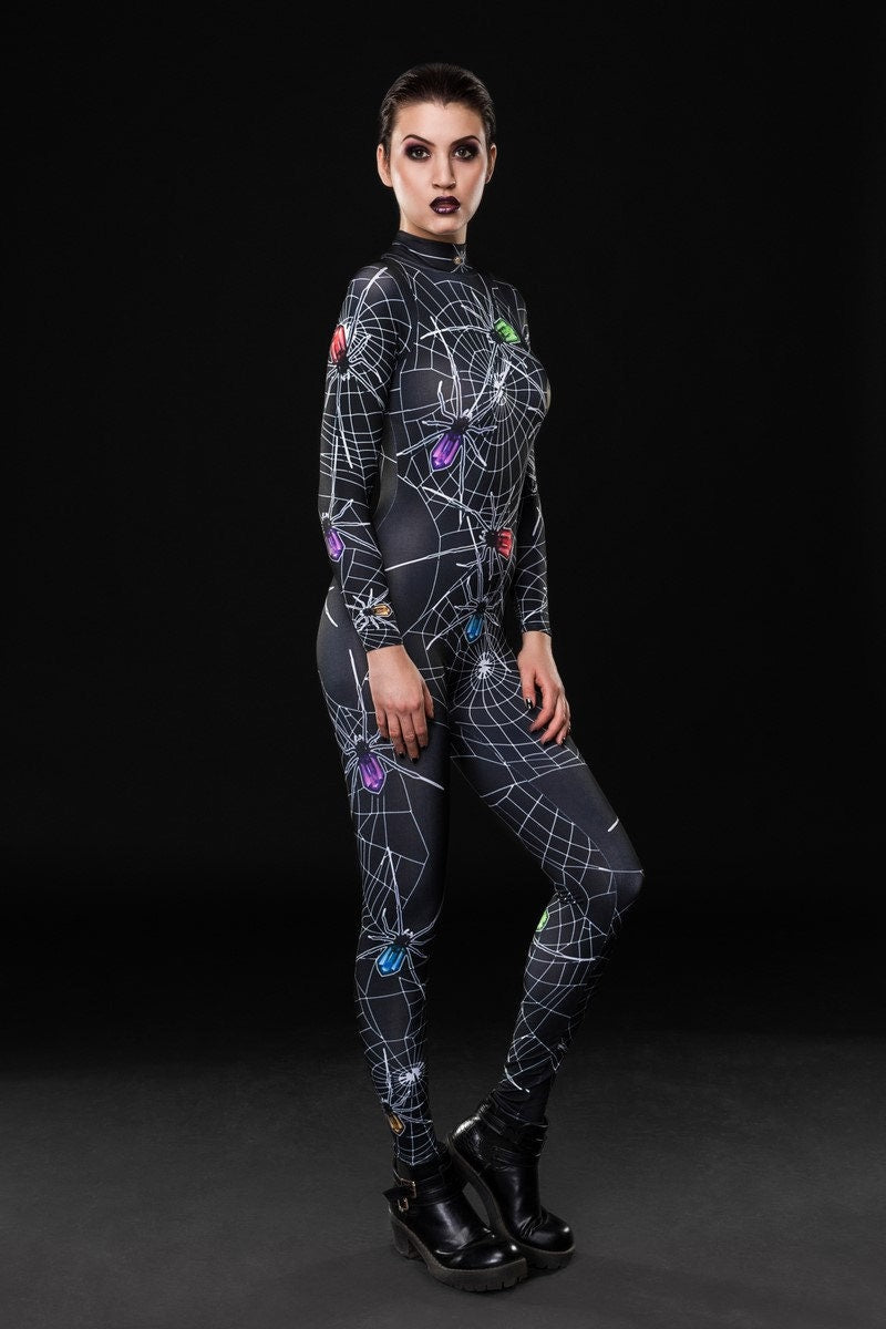 Woman posing in the Spider Queen Halloween costume, highlighting the sleek spiderweb design on a black catsuit, great for Halloween or as a standout gothic festival outfit.