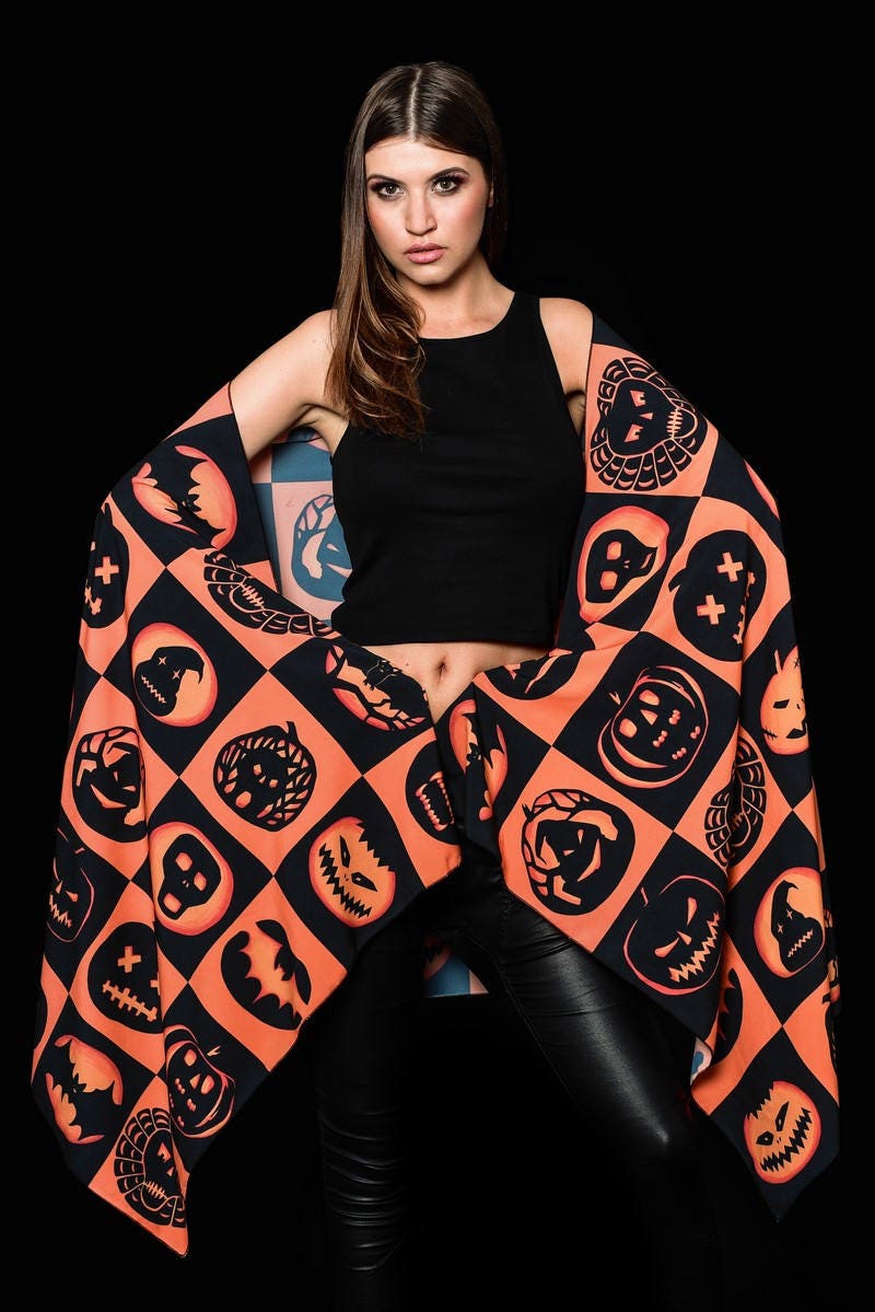 Halloween Pumpkins scarf featuring pumpkin, bat, and skull designs, perfect as a Halloween shawl or festive autumn accessory.