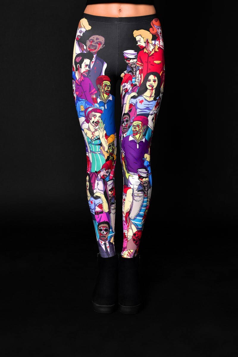 Woman posing in the Zombie Nation leggings, highlighting the intricate zombie print design, great for Halloween or as fun, everyday printed leggings.