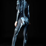 Woman wearing the Dark Skeleton Halloween costume, a gothic full-body catsuit with blue skeleton and skull moth accents, perfect for Halloween parties or gothic festivals.