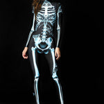 Dark Skeleton Halloween costume for women, featuring a gothic blue skeleton catsuit with skull moth details, perfect for Halloween or gothic-themed events.