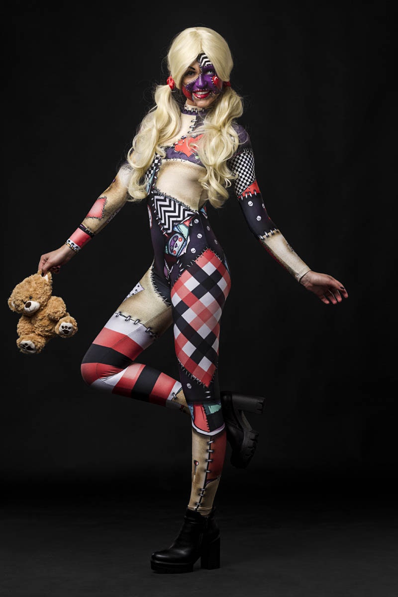 Woman posing in the Halloween Rag Doll costume, showcasing the detailed rag doll stitching and spooky design, perfect for Halloween parties or costume festivals.