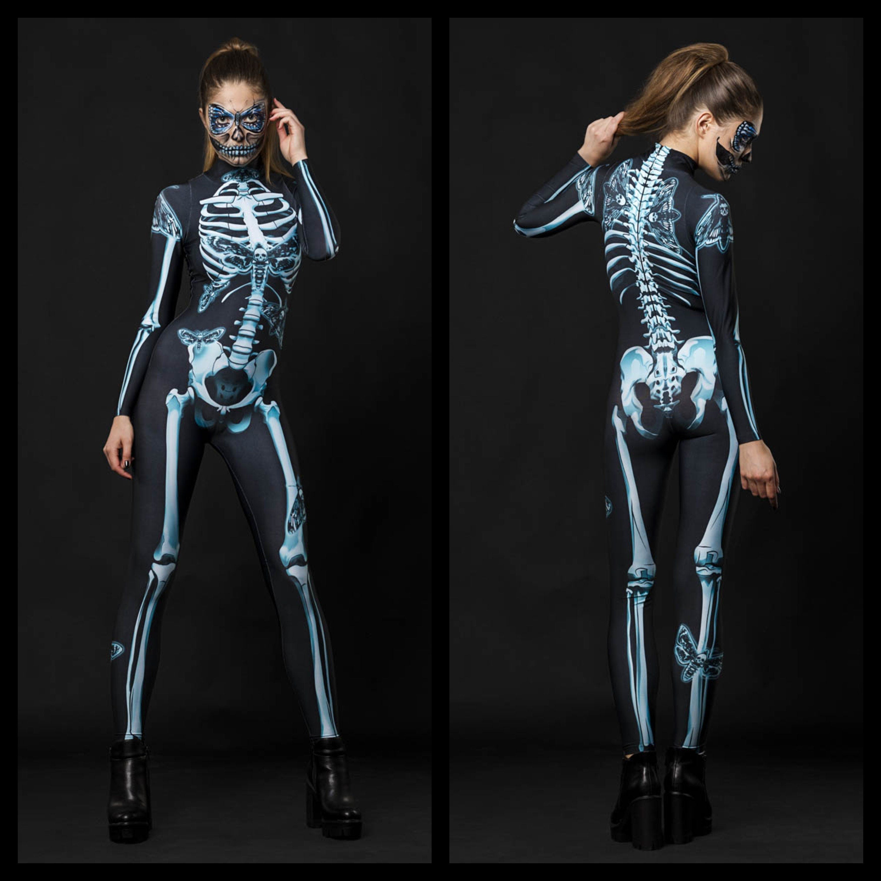 Woman wearing the Lady Moth skeleton costume, a full-body catsuit with detailed moth and skeleton designs, great for Halloween or Day of the Dead celebrations.