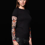 Woman wearing the Pumpkin Halloween T-shirt with tattoo-style pumpkin sleeves, ideal for Halloween events or casual Halloween fashion.