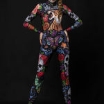 Tattoo Style Halloween costume for women, featuring a full-body catsuit with tiger, skull, and butterfly designs, perfect for Halloween parties or festival cosplay.