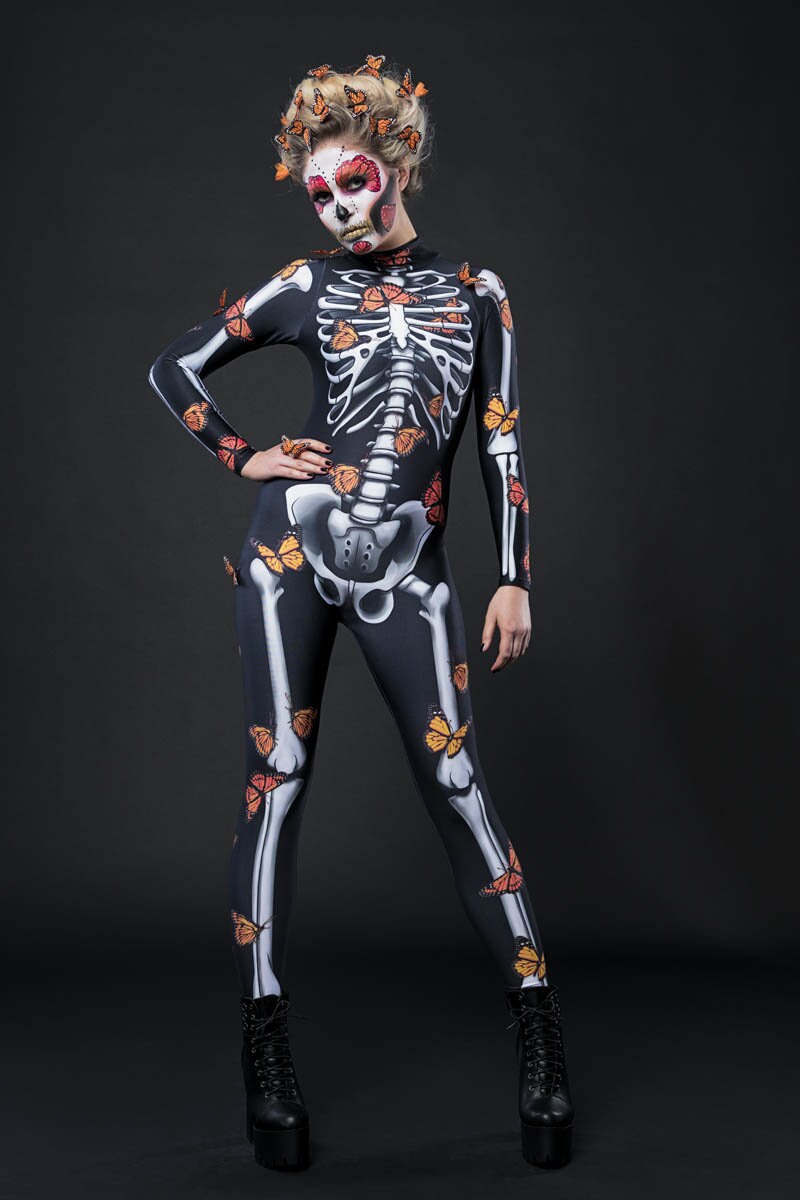 Woman posing in the Lady Butterfly Skeleton costume, showcasing vibrant butterfly wings and a skeleton theme, perfect for Halloween or as a standout festival outfit.