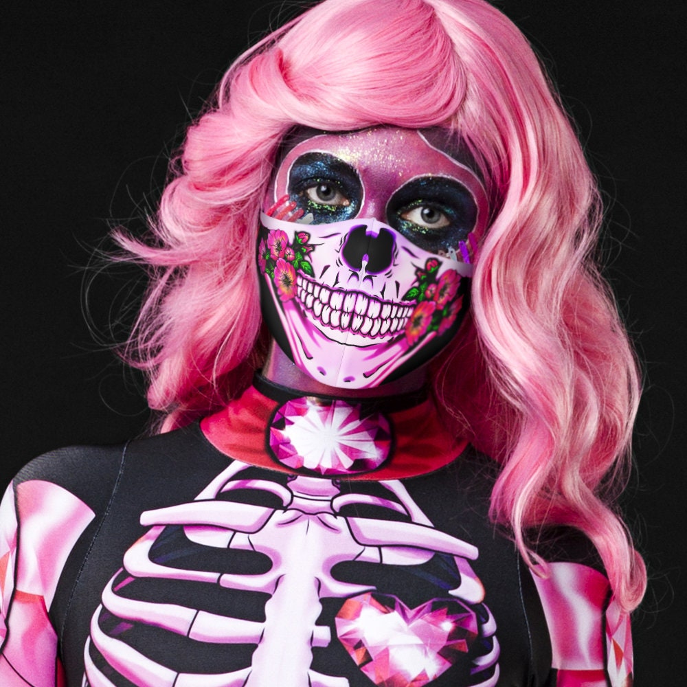 Close-up of the pastel pink skeleton and sugar skull design on the catsuit, showcasing intricate details for a striking Halloween or festival look.