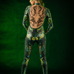 Woman posing in the Green Snake Halloween costume, highlighting the sleek green snake skin design and tattoo effect, great for Halloween events or as a unique festival outfit.