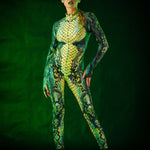 Green Snake Halloween costume for women, featuring a snake skin jumpsuit with tattoo effect on the back, ideal for Halloween parties or music festivals.