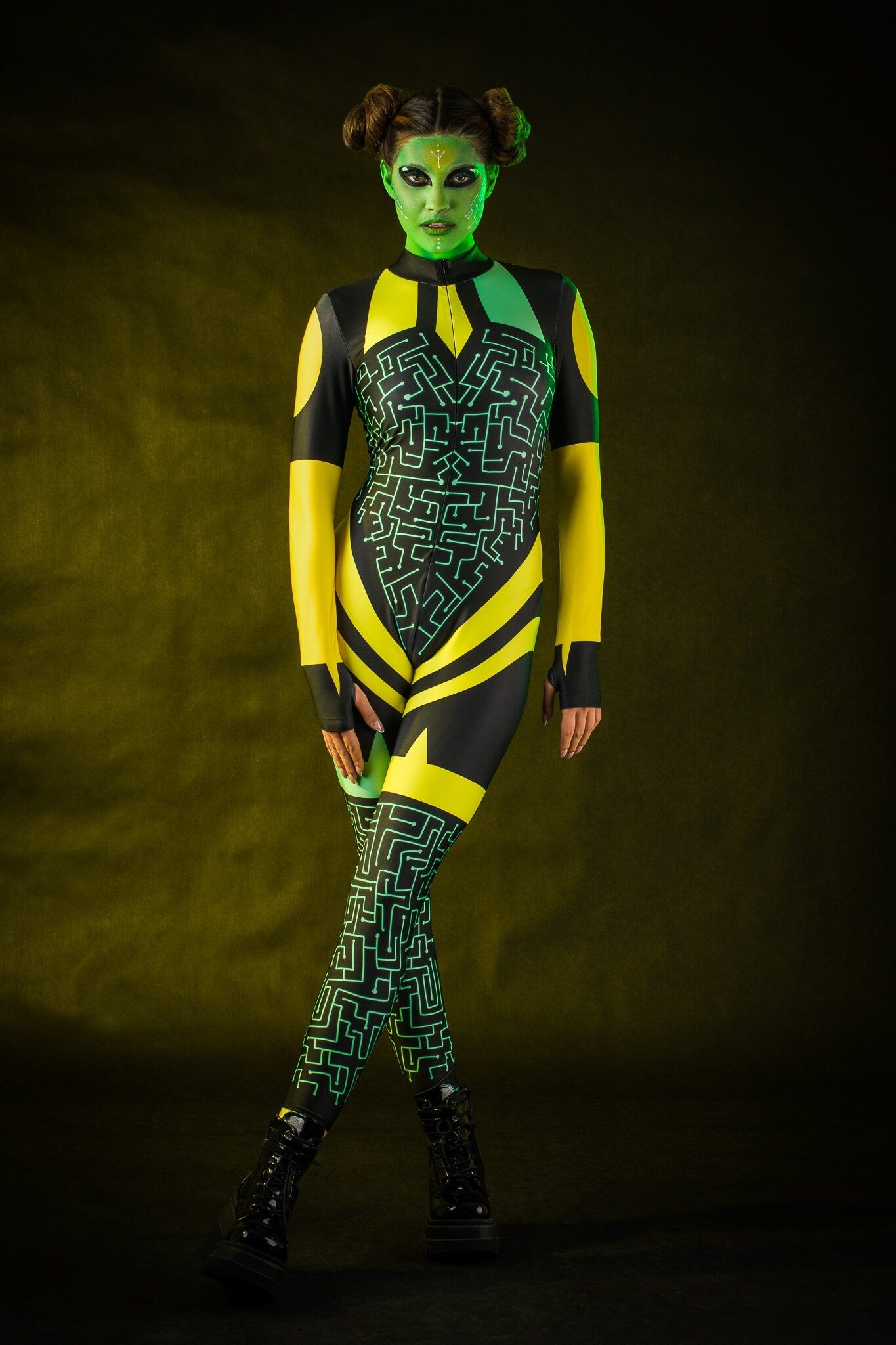 Green Alien Halloween costume for women, featuring a full-body jumpsuit with tattoo effect on the back, inspired by UFO and alien themes, perfect for Halloween or cosplay events.