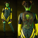 Woman wearing the Green Alien Halloween costume, a full-body UFO-themed jumpsuit with intricate tattoo details, perfect for Halloween parties or alien cosplay.