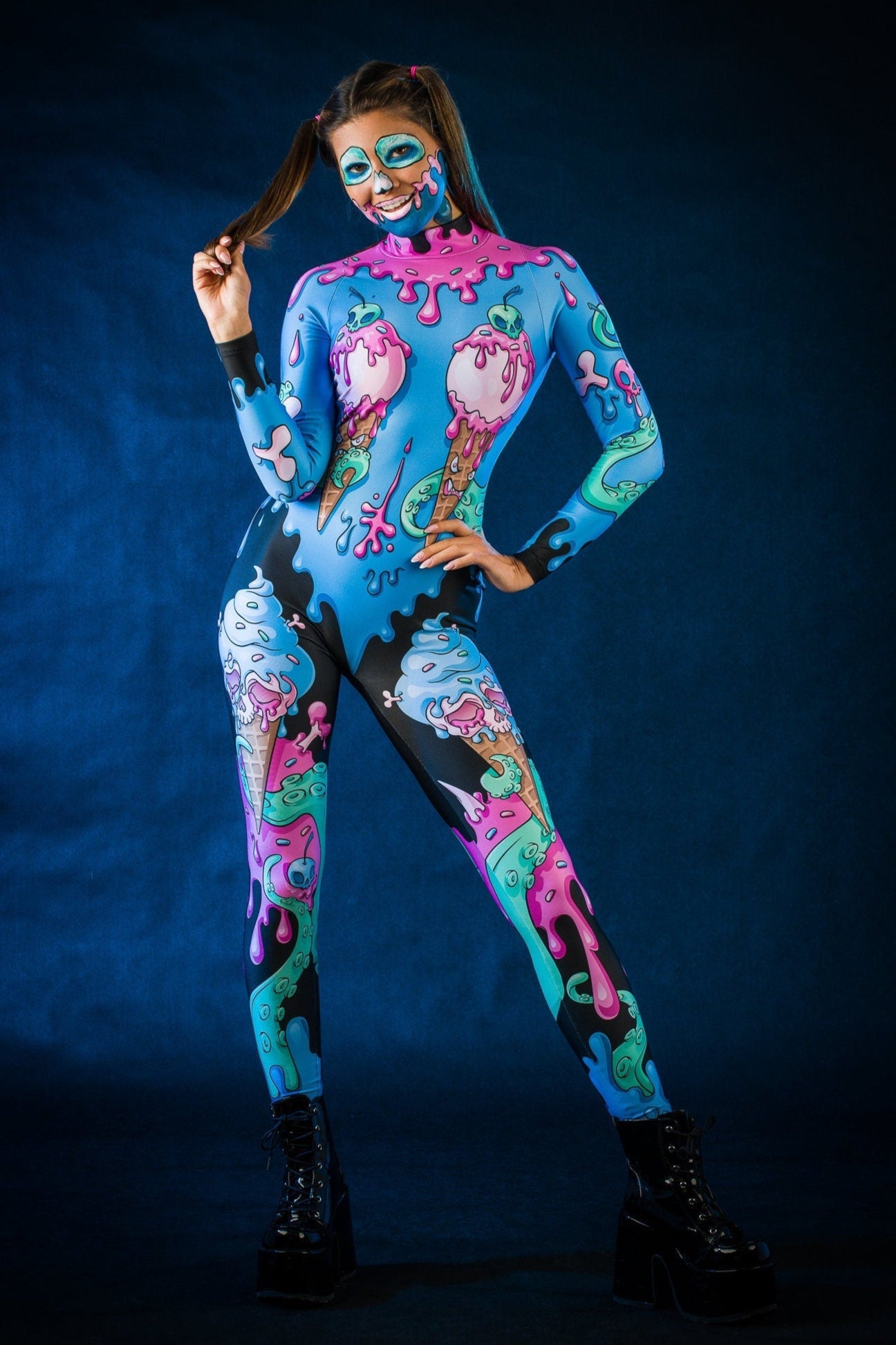 Woman wearing the Sweet Ice Cream Skulls costume, a full-body jumpsuit with colorful skulls and ice cream motifs, perfect for Halloween or cosplay festivals.