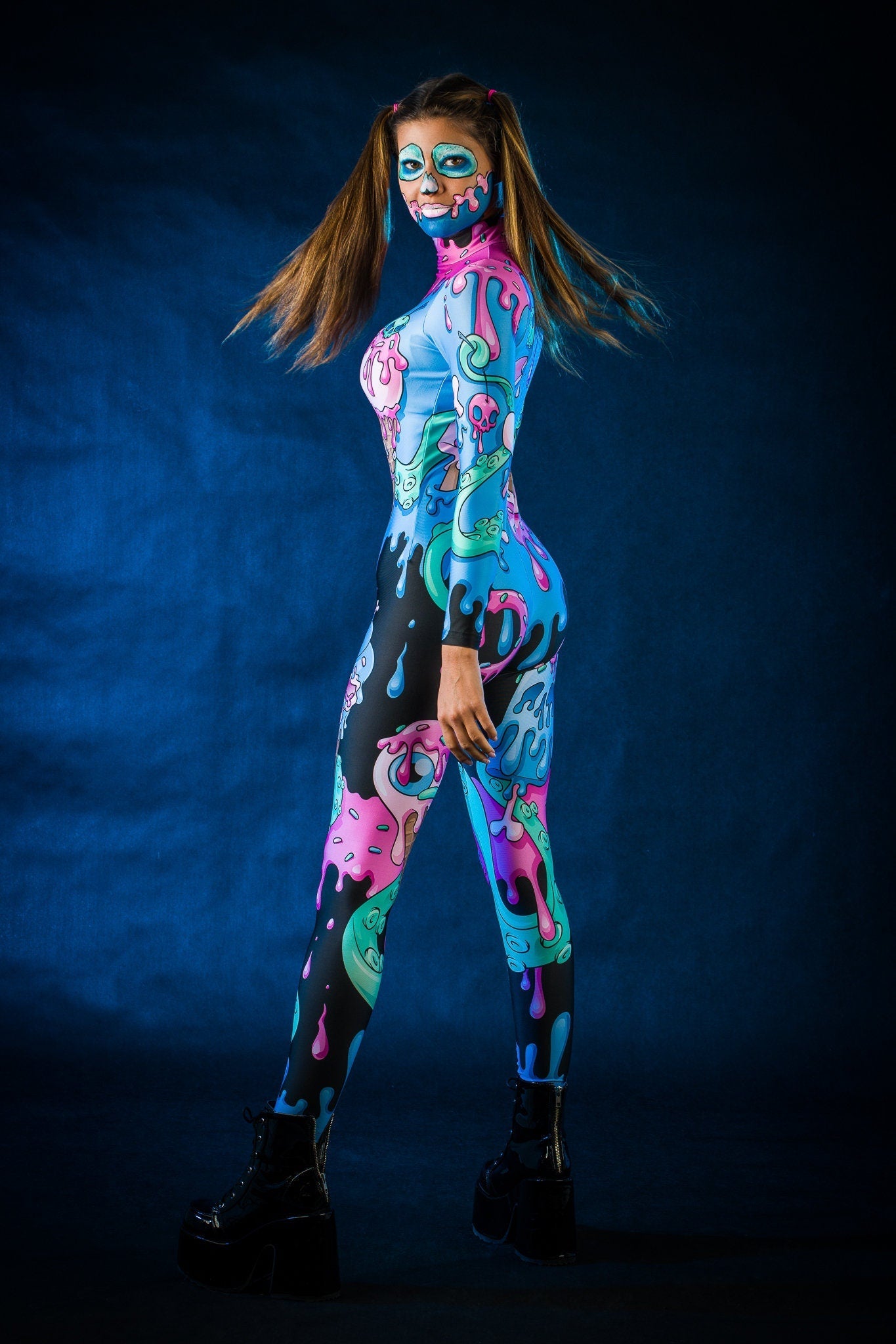 Woman posing in the Sweet Ice Cream Skulls Halloween costume, highlighting the vibrant pink and blue skull and ice cream design, great for Halloween or as a fun festival outfit.