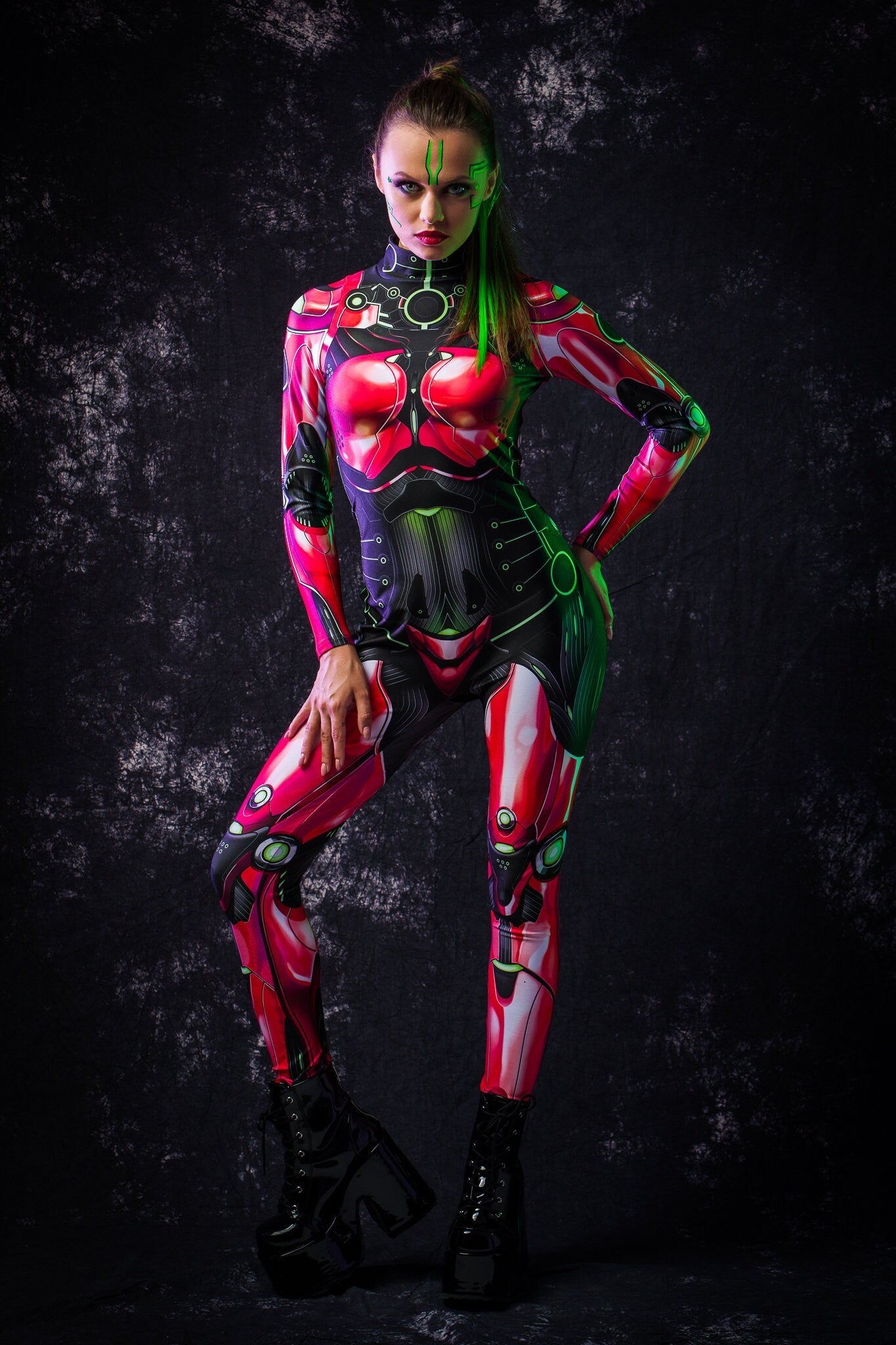 Woman wearing the Red Android costume, a full-body robot-inspired catsuit with cyberpunk details, perfect for Halloween parties or sci-fi cosplay.