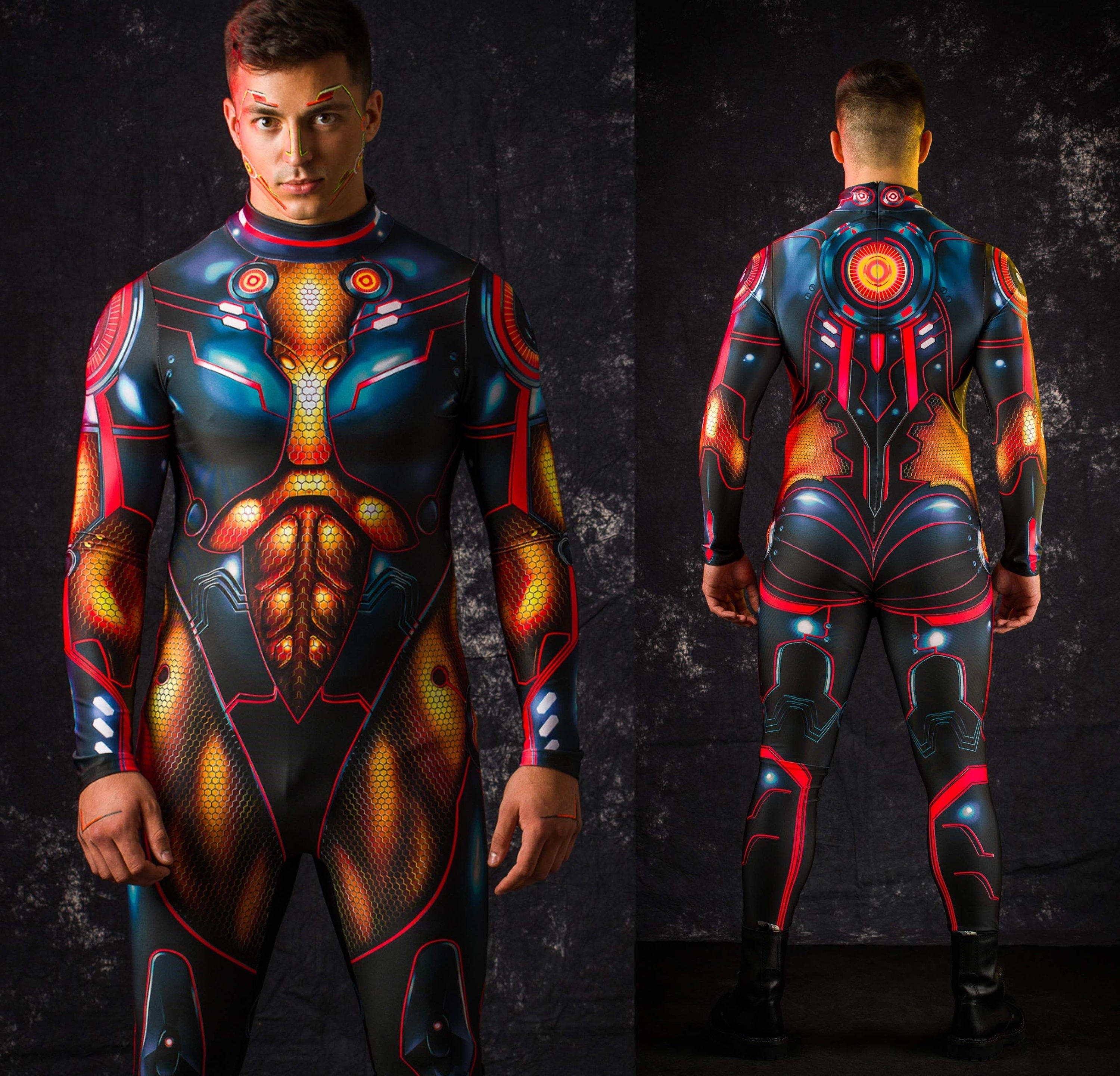 Man posing in the Graphite Cyber Hero Halloween costume, highlighting the sleek robotic design and gold details, great for Halloween or as a standout cosplay outfit.