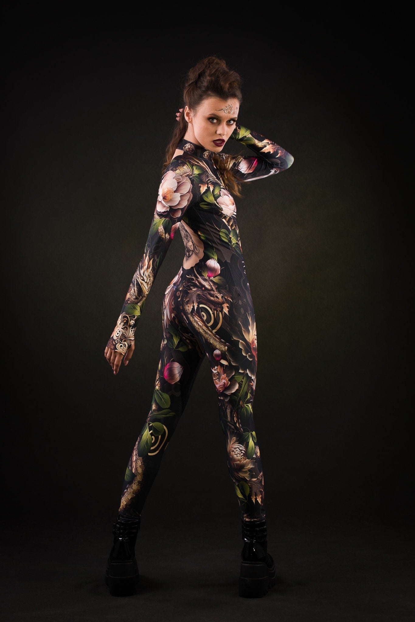 Woman wearing the Sister of Dragons costume, a full-body dragon-themed catsuit with tattoo effect, perfect for Halloween parties or fantasy-themed cosplay.