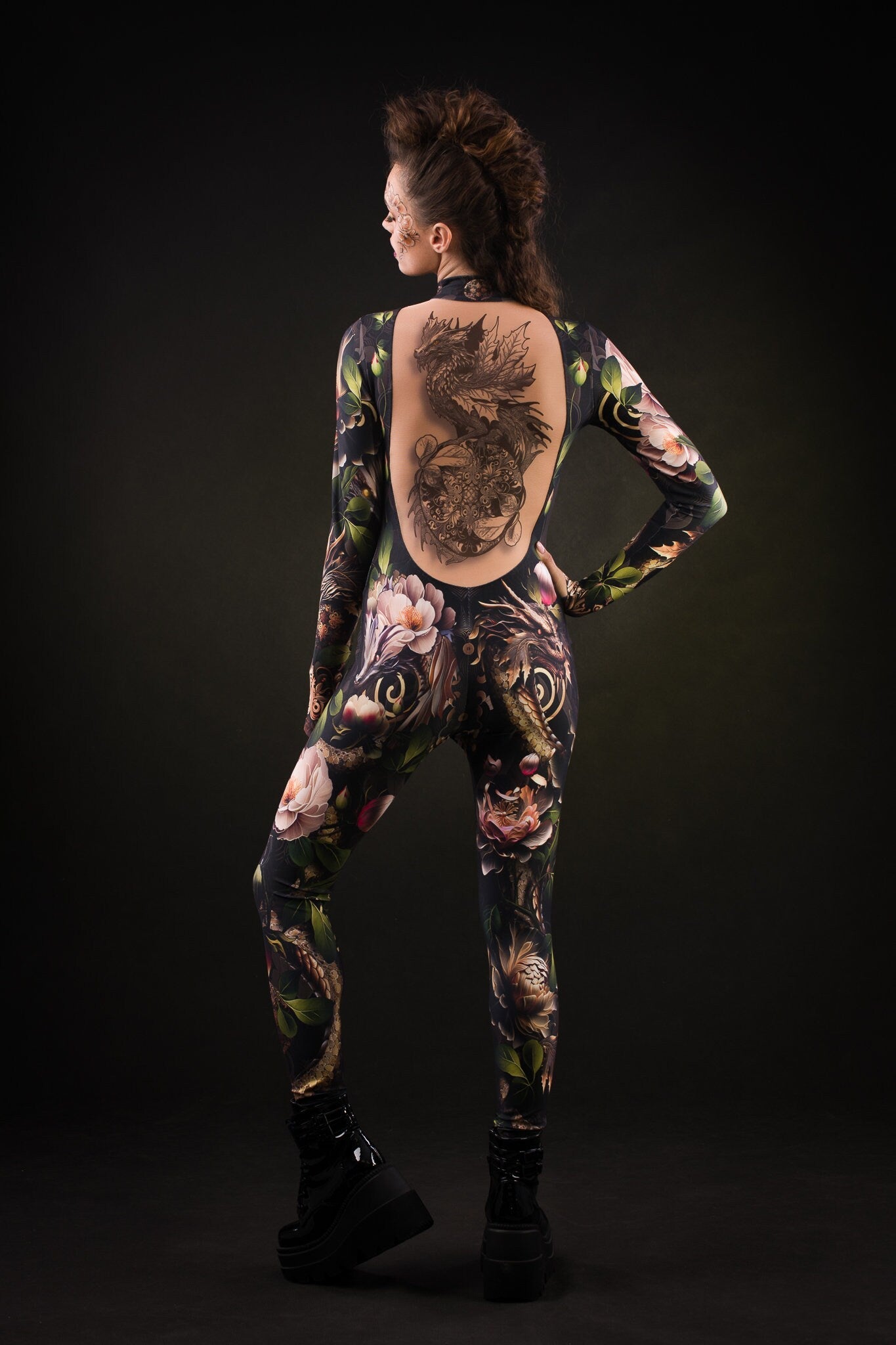 Close-up of the intricate dragon design and tattoo effect on the back of the Sister of Dragons catsuit, ideal for a bold Halloween or festival look.