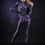 Woman posing in the Flower Skeleton costume, showcasing vibrant purple and blue skeleton design with flowers, ideal for Halloween or as a striking festival outfit.