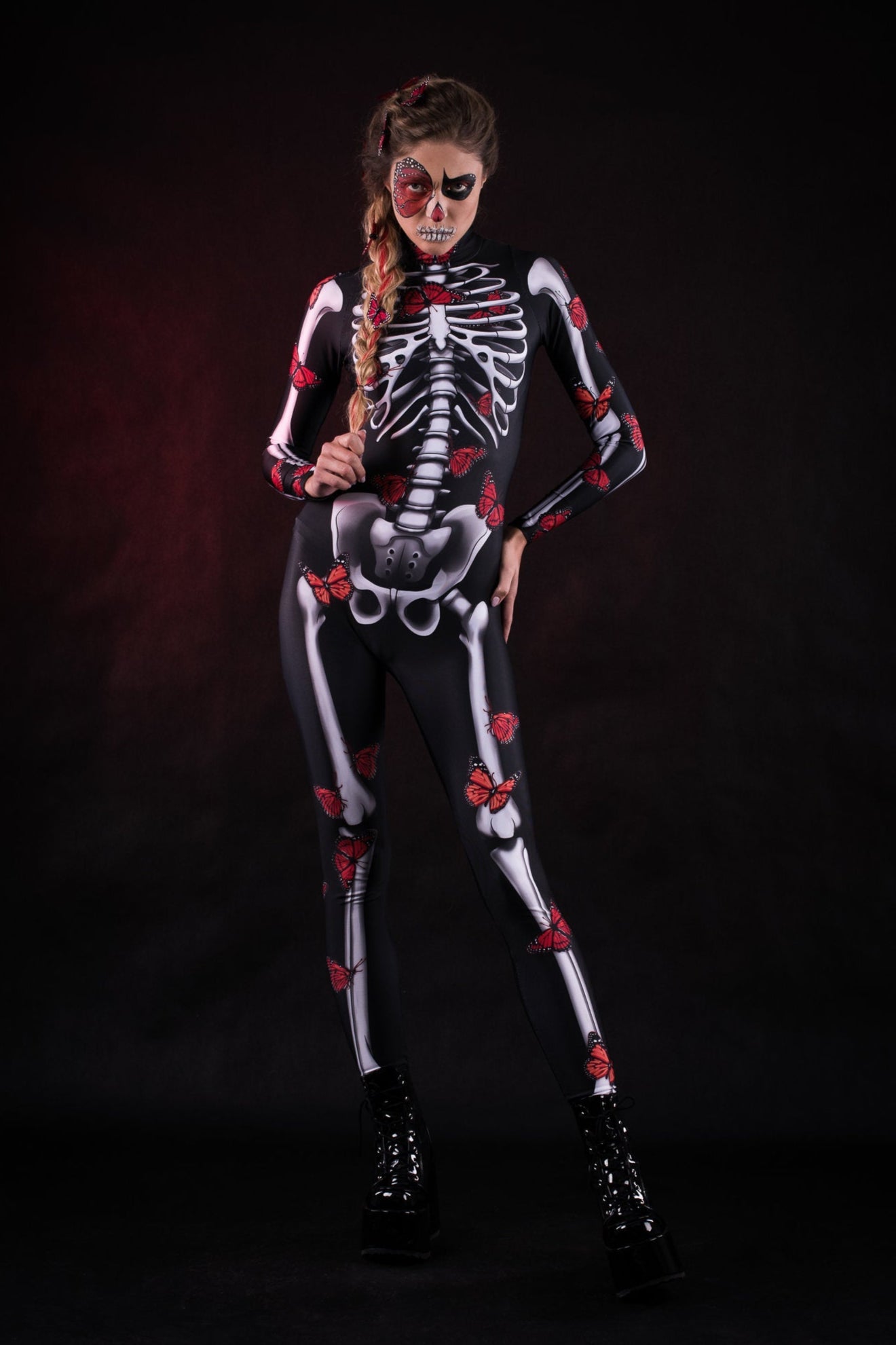 Lady Red Butterfly Halloween costume for women, featuring a full-body skeleton catsuit with vibrant red and blue butterfly accents, perfect for Halloween or Day of the Dead celebrations.