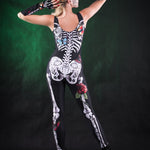 Close-up of the white skeleton design with detailed rose and butterfly accents on the jumpsuit and matching kimono, ideal for Halloween or festival fashion.