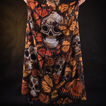 Woman posing in the Orange Butterflies Skeleton jumpsuit with kimono, highlighting the detailed butterfly and skeleton design, great for Halloween parties or as a standout festival outfit.