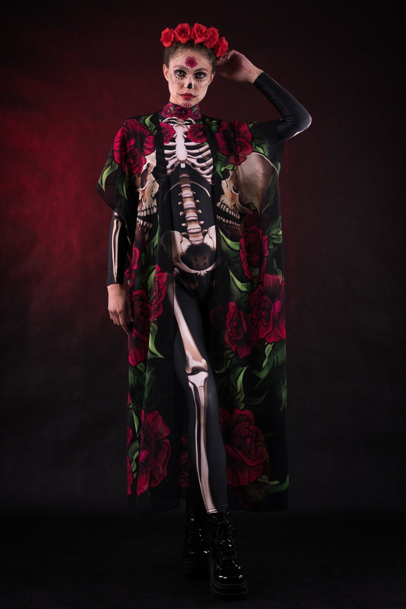 Women wearing a skeleton bodysuit with red rose. Kimono with roses. Styled for Halloween. The outfit is inspired by Day of the Dead.