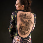 Close-up of the intricate dragon design and tattoo effect on the back of the Sister of Dragons catsuit, ideal for a bold Halloween or festival look.