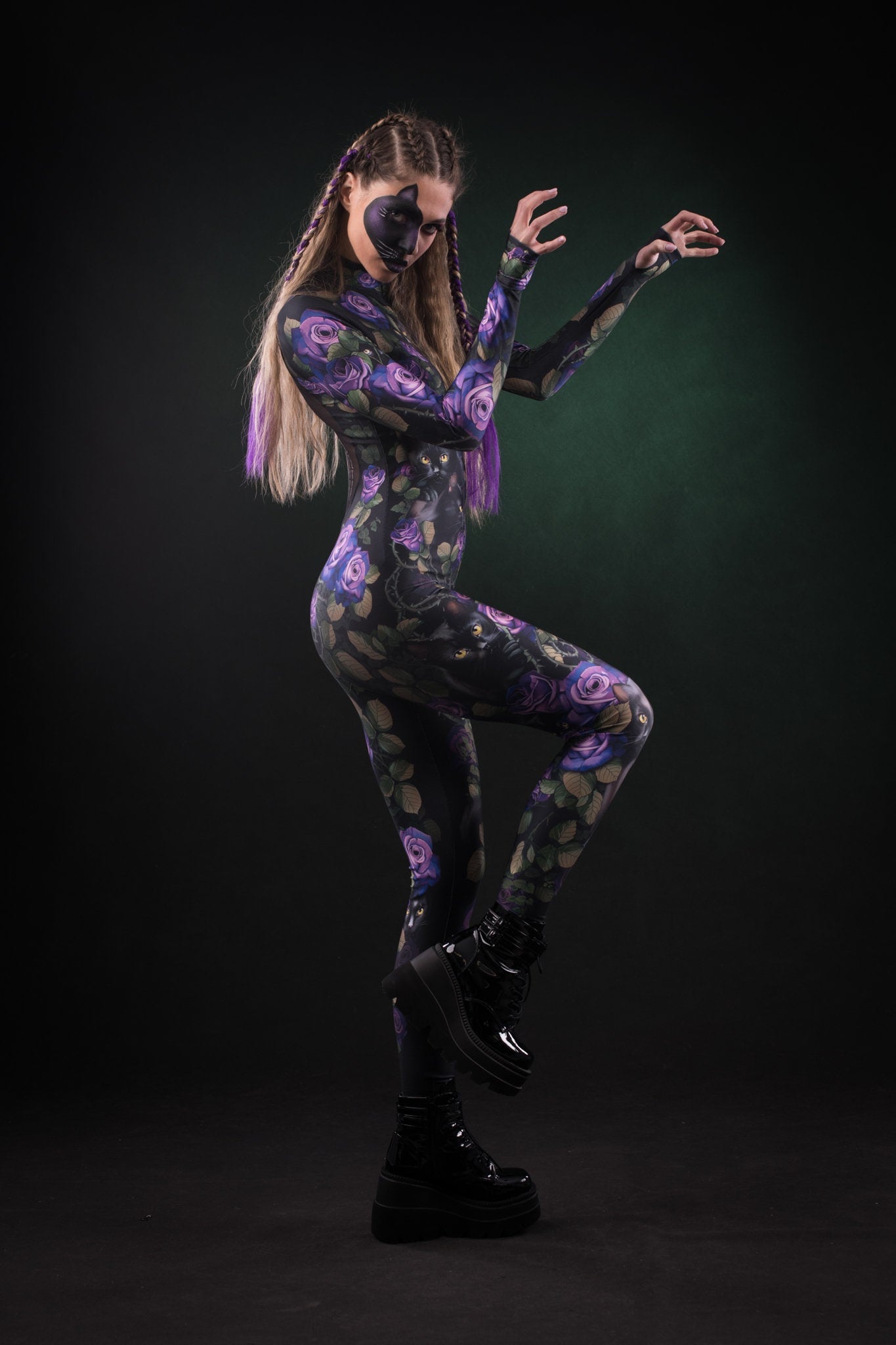 Woman posing in the Mystic Cats Halloween costume, highlighting the detailed tattoo effect and mystical cats design, perfect for Halloween or cosplay festivals.