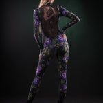 Woman posing in the Mystic Cats Halloween costume, highlighting the detailed tattoo effect and mystical cats design, perfect for Halloween or cosplay festivals.