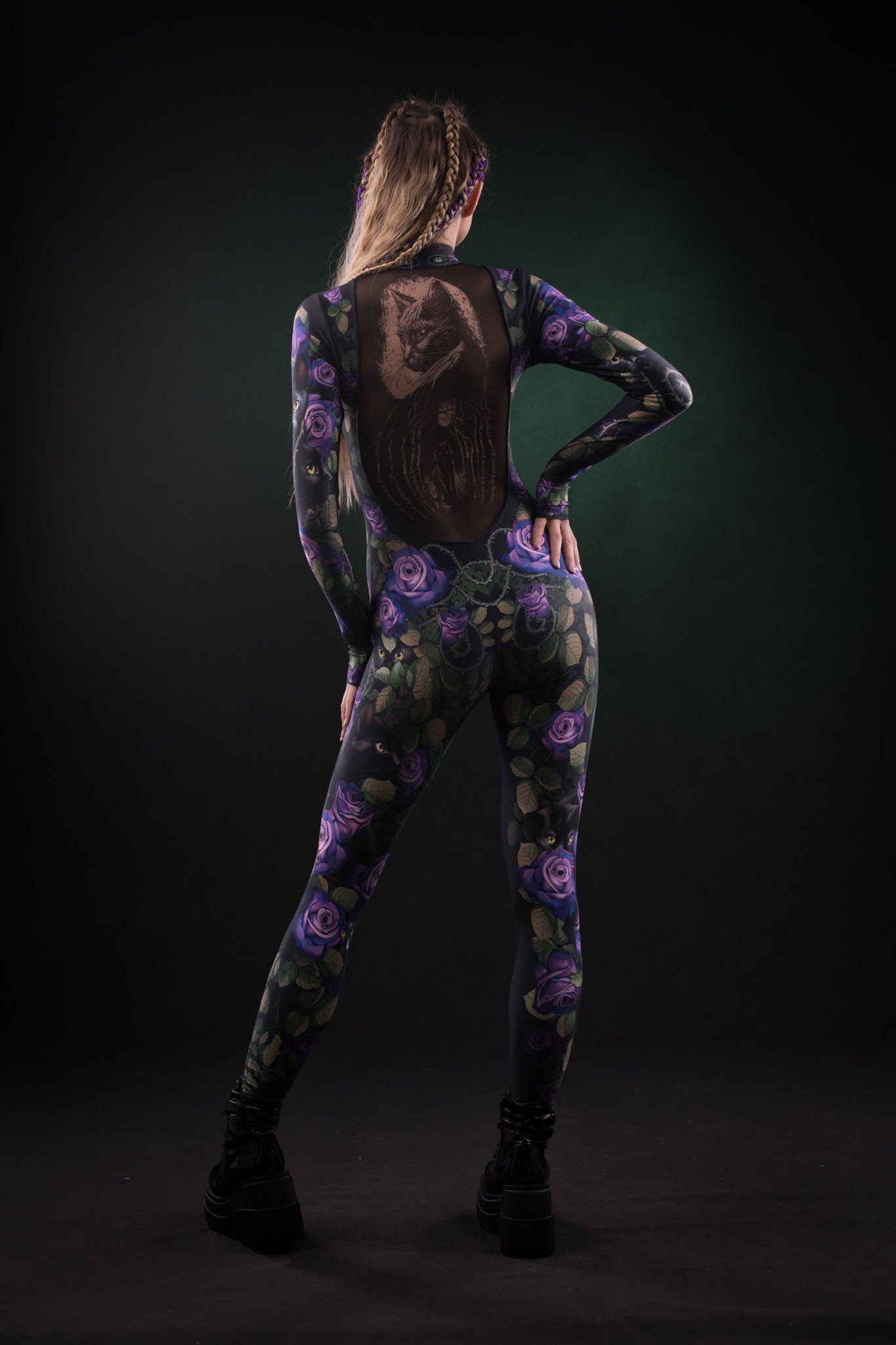 Woman posing in the Mystic Cats Halloween costume, highlighting the detailed tattoo effect and mystical cats design, perfect for Halloween or cosplay festivals.