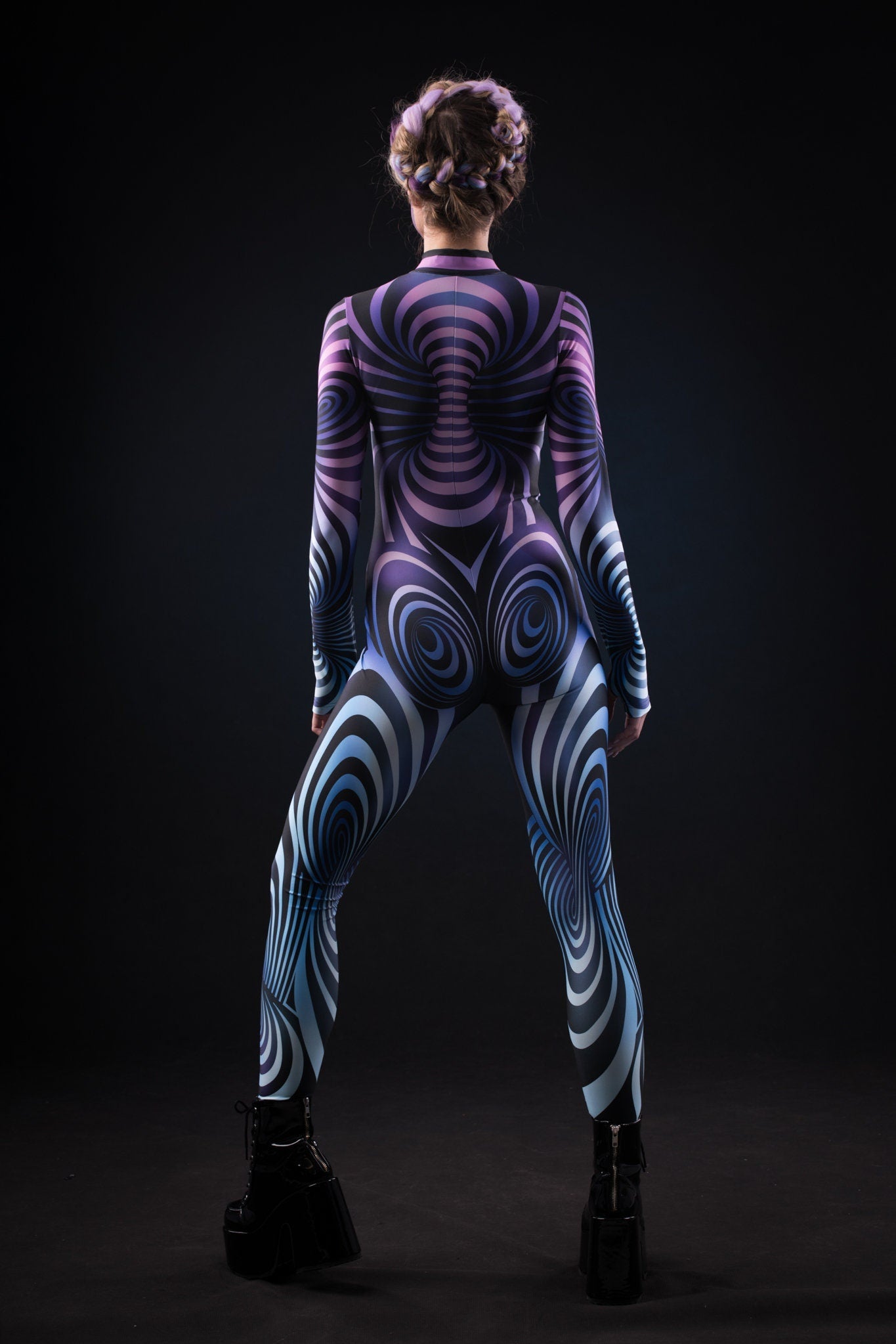 Close-up of the hypnotizing 3D spiral design on the purple catsuit, ideal for a bold and eye-catching Halloween or festival look