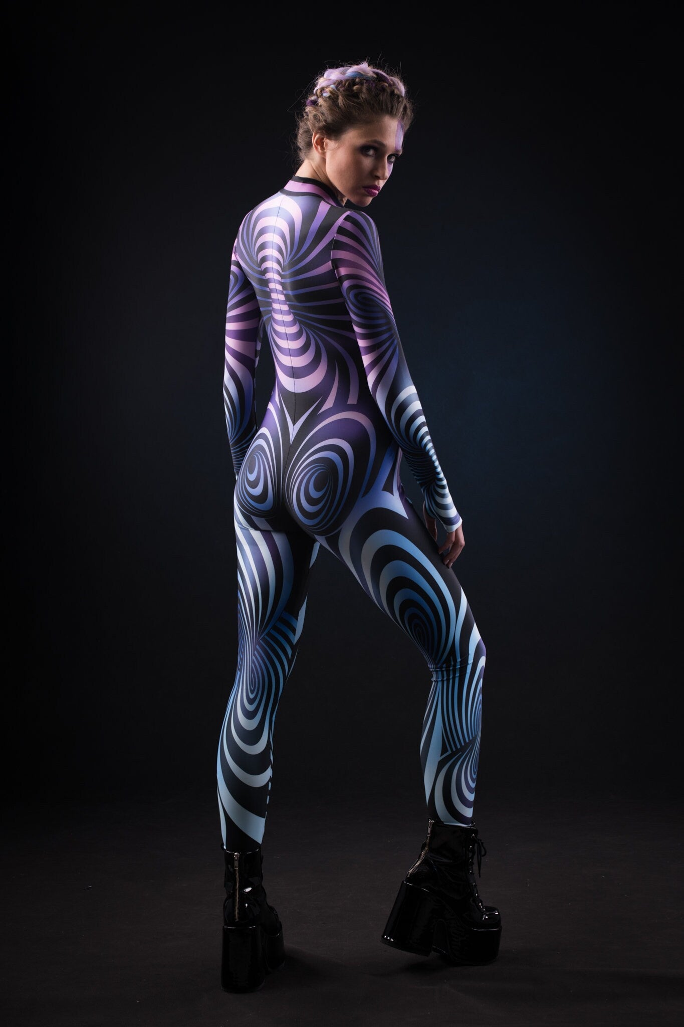 Close-up of the hypnotizing 3D spiral design on the purple catsuit, ideal for a bold and eye-catching Halloween or festival look