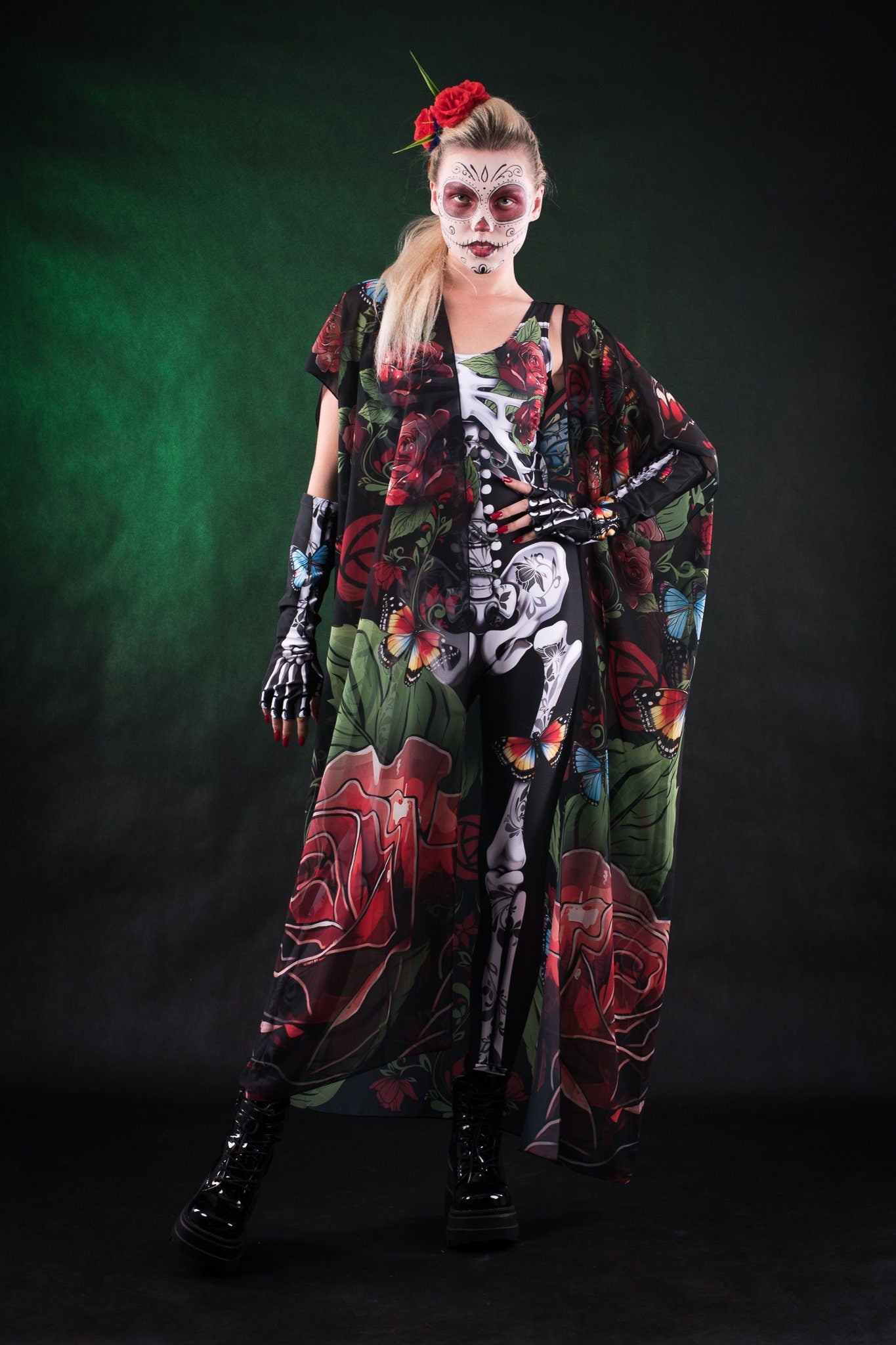 Woman posing in the Roses and Butterflies kimono cape, showcasing the vibrant rose and butterfly design, great for Halloween parties or as a unique festival outfit.