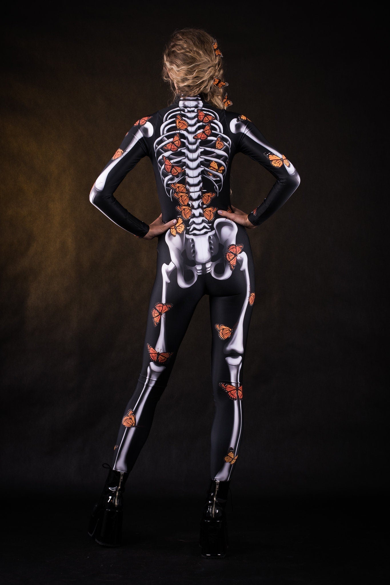 Close-up of the orange butterfly and skeleton design on the Lady Orange Butterfly costume, highlighting intricate details on the matching kimono, ideal for Halloween or festival fashion.