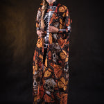 Woman wearing the Lady Orange Butterfly skeleton costume, featuring a colorful kimono with vibrant orange butterfly accents, perfect for Halloween parties or Day of the Dead events.