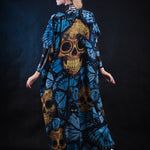 Woman wearing the Blue Monarchy Butterflies kimono Halloween cape, featuring a long, flowing silhouette with striking blue butterfly accents, ideal for Halloween or cosplay.