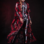 Woman wearing the Red Monarchy Butterflies kimono cape, featuring detailed butterfly accents and a flowing design, perfect for Day of the Dead or Halloween events.