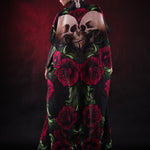 Woman wearing the Lady Death kimono Halloween cape, featuring a black cape with skull and rose accents, perfect for Halloween or Day of the Dead events.